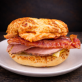 asiago bagel sandwich with pimento cheese bacon and ham