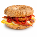 everything bagel sandwich with egg cheese bacon hash brown and ketchup